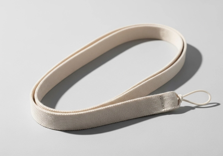 A soft, natural-looking organic cotton lanyard.