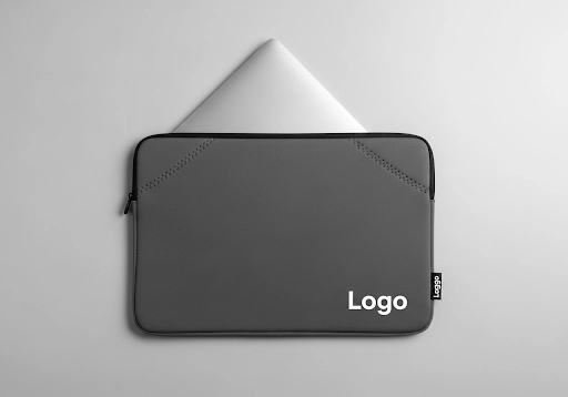 A sleek, custom-branded neoprene laptop sleeve.