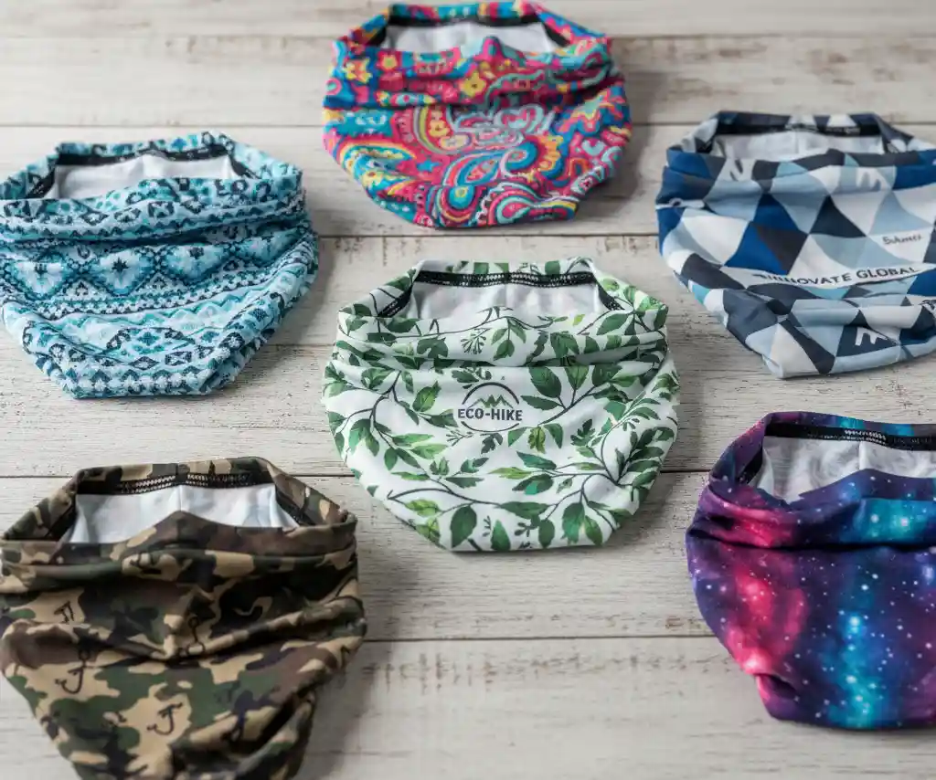 A collection of custom-printed neck gaiters in various seamless, full-color designs.