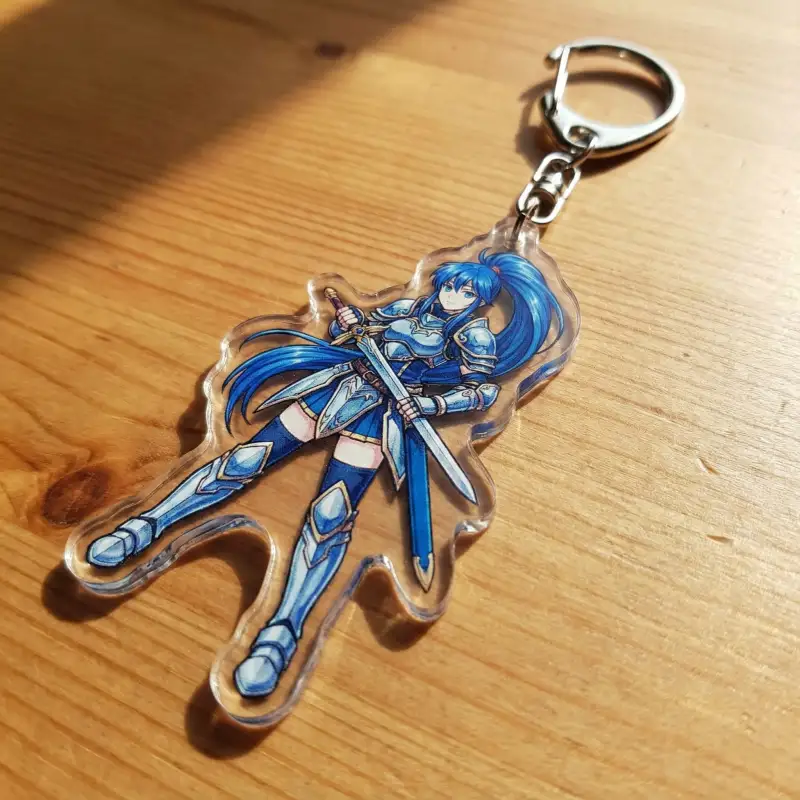 Clear acrylic keychain with a full-color printed anime character, showing transparency.