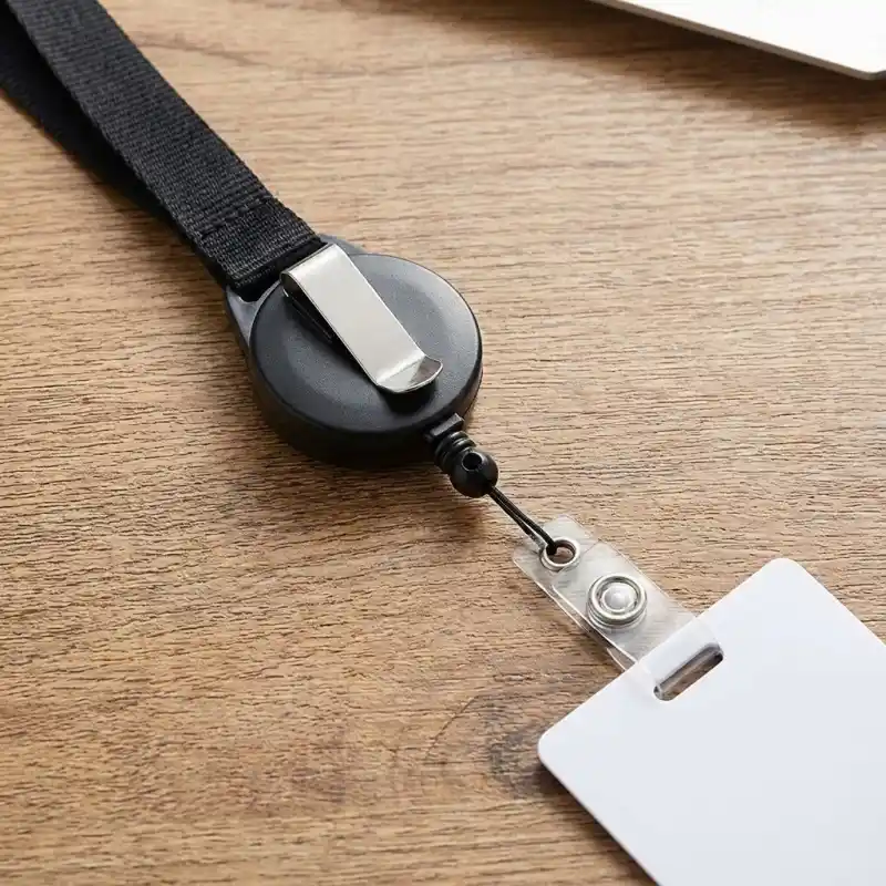 A retractable badge reel lanyard attachment.