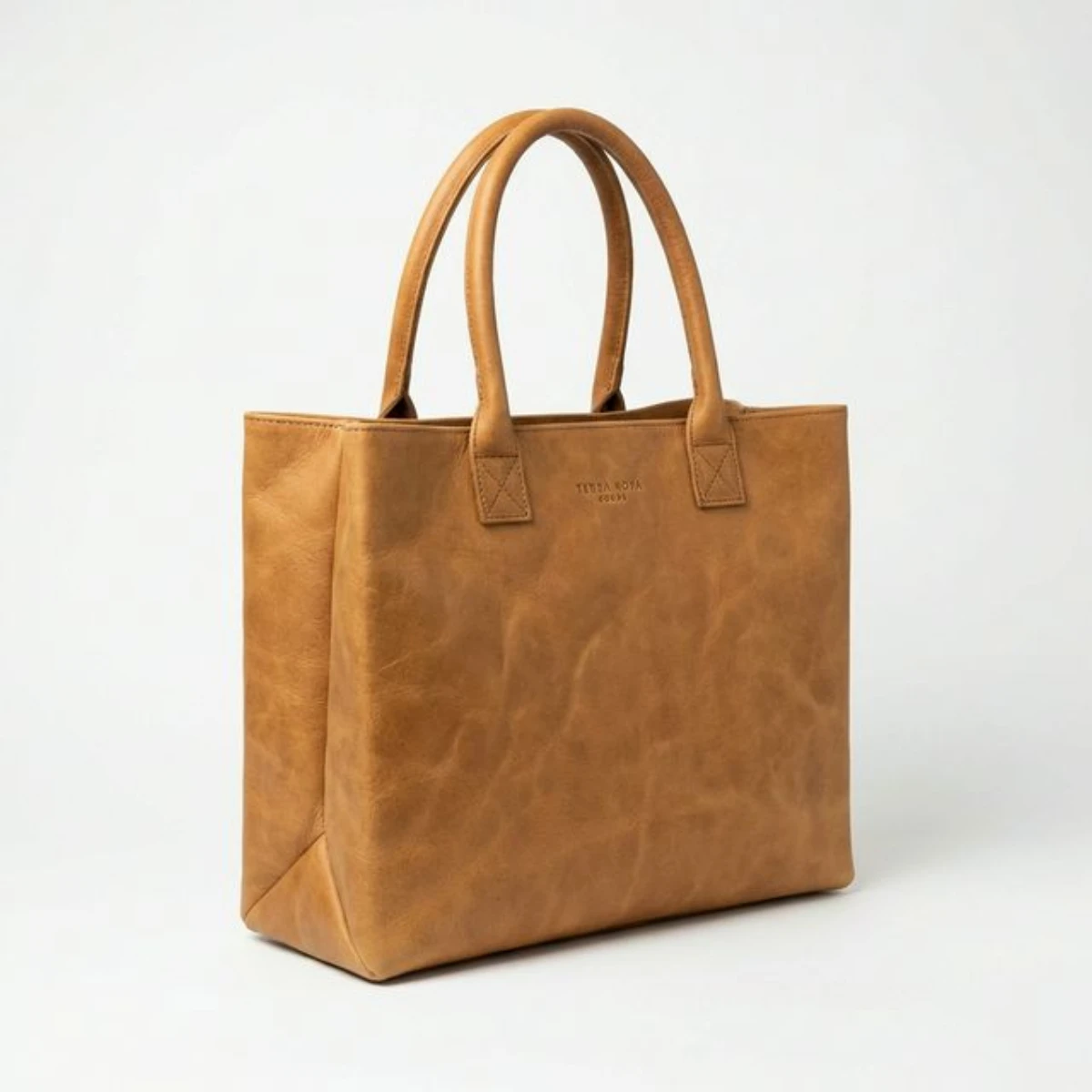 A premium box-style kraft tote with full side and bottom gussets.